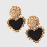 עגילי מתכת עם לבבות של הילה