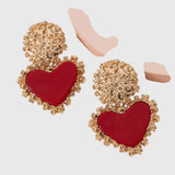 עגילי מתכת עם לבבות של הילה