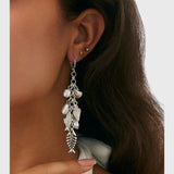 עגילי תליון דג שירה