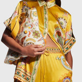 חולצת סאטן בגזרה גדולה עם קשיו