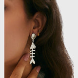 עגילי תליון דג שירה