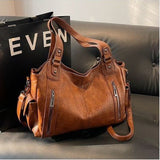 תיק עור של טל