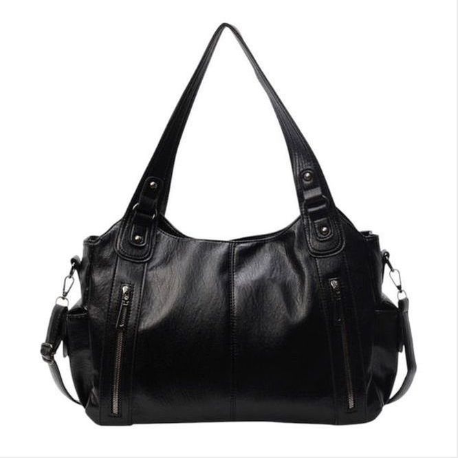 תיק עור של טל