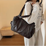 תיק עור של טל